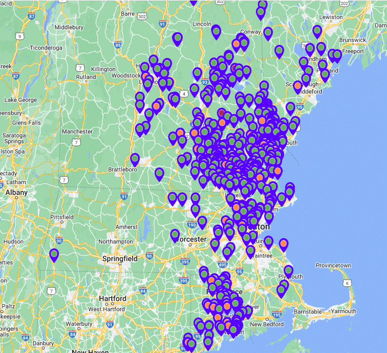 A map of Massachusetts and nearby states shows hundreds of blue and red markers highlighting solar installations clustered across Massachusetts.