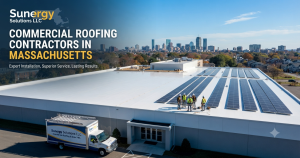A completed, high-quality white membrane commercial roof featuring integrated solar panels.